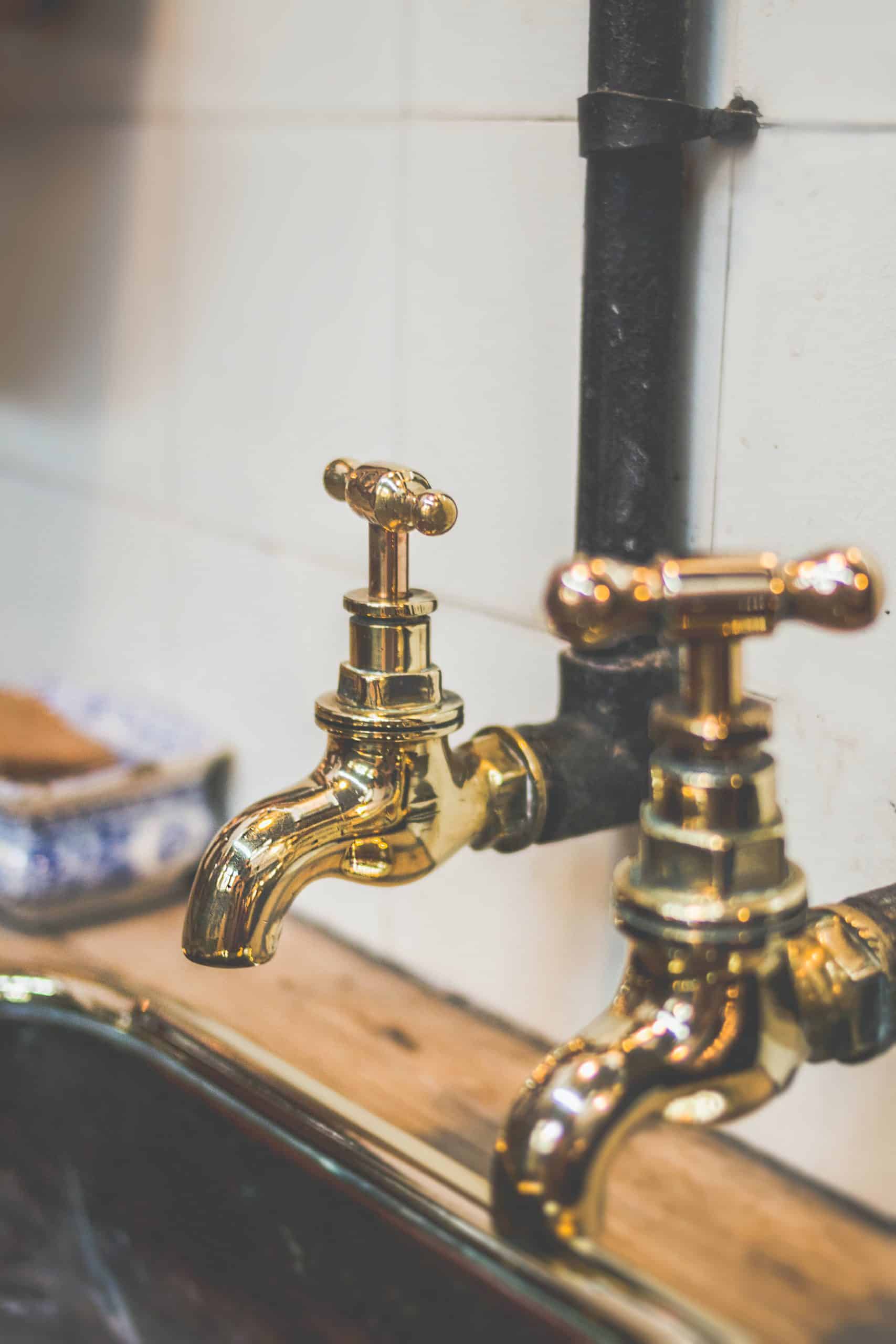 Home 38 Shiny gold taps on a sink. clarkes plumbing